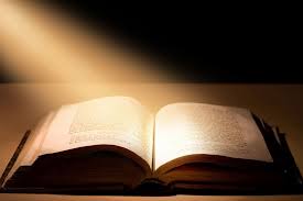 Bible with light shinnin on it