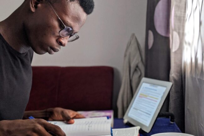 man reading book