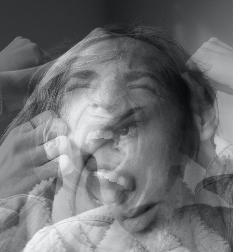 grayscale photo of man in suit