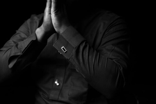 grayscale photo of man wearing dress shirt