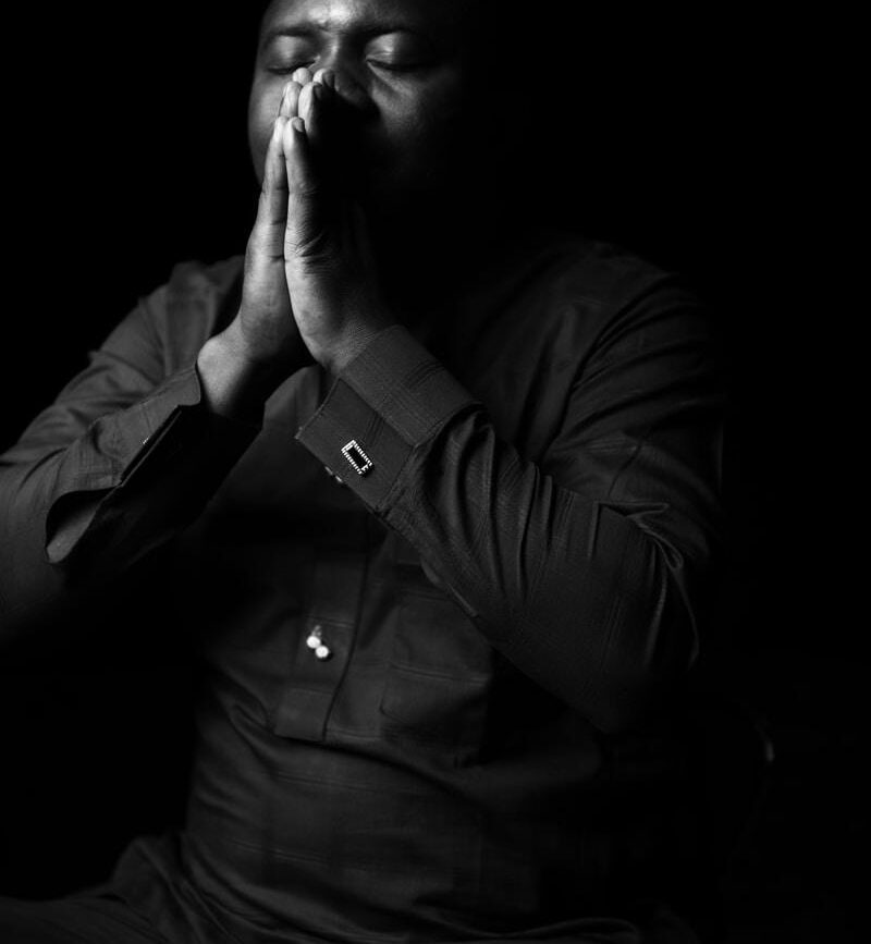 grayscale photo of man wearing dress shirt