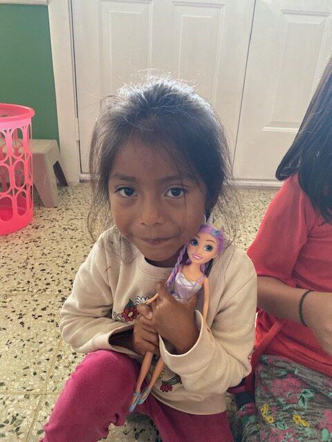 Jimena & Her New Doll