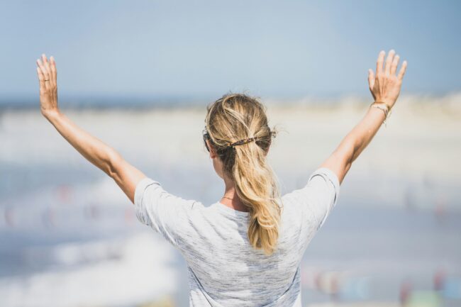 woman hands up