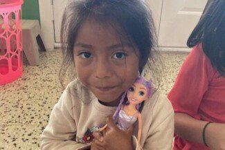 Jimena & Her New Doll