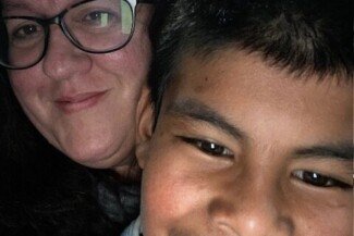 Monica Sharing God’s Love with Romario.